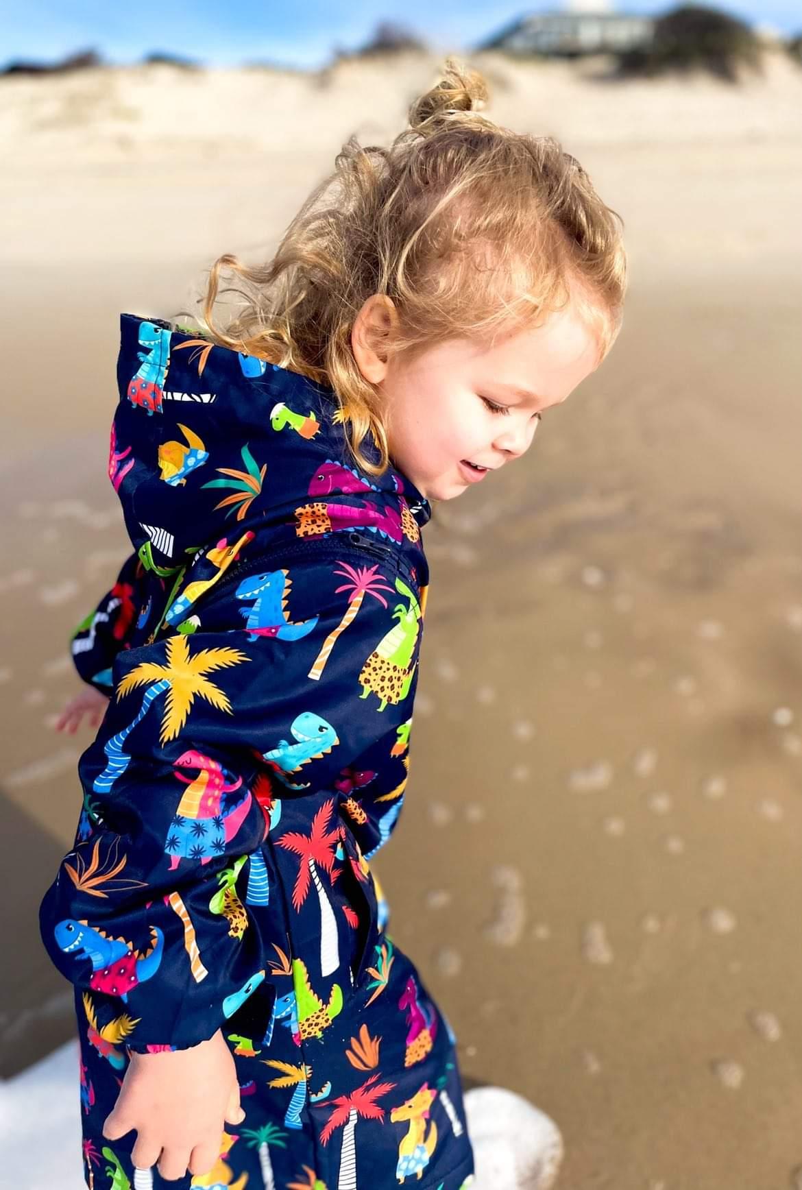 Dinosaur print swim parka. Beach robe, pool cover up. Dinosaur lovers welcome our kids swim parka by Schmik. 