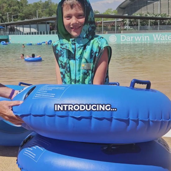 Schmik swim parka Neon Dream. All season swim parka with removable sleeves. Perfect for beach and pool days. 