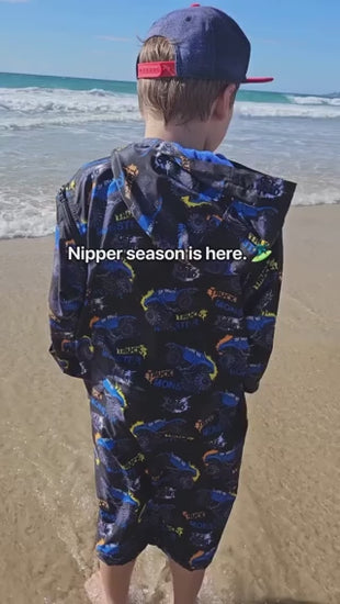 Versatile Monster Truck Parka for kids, warm, dry, towel-lined, and stylish, perfect for swimming, boating, or camping