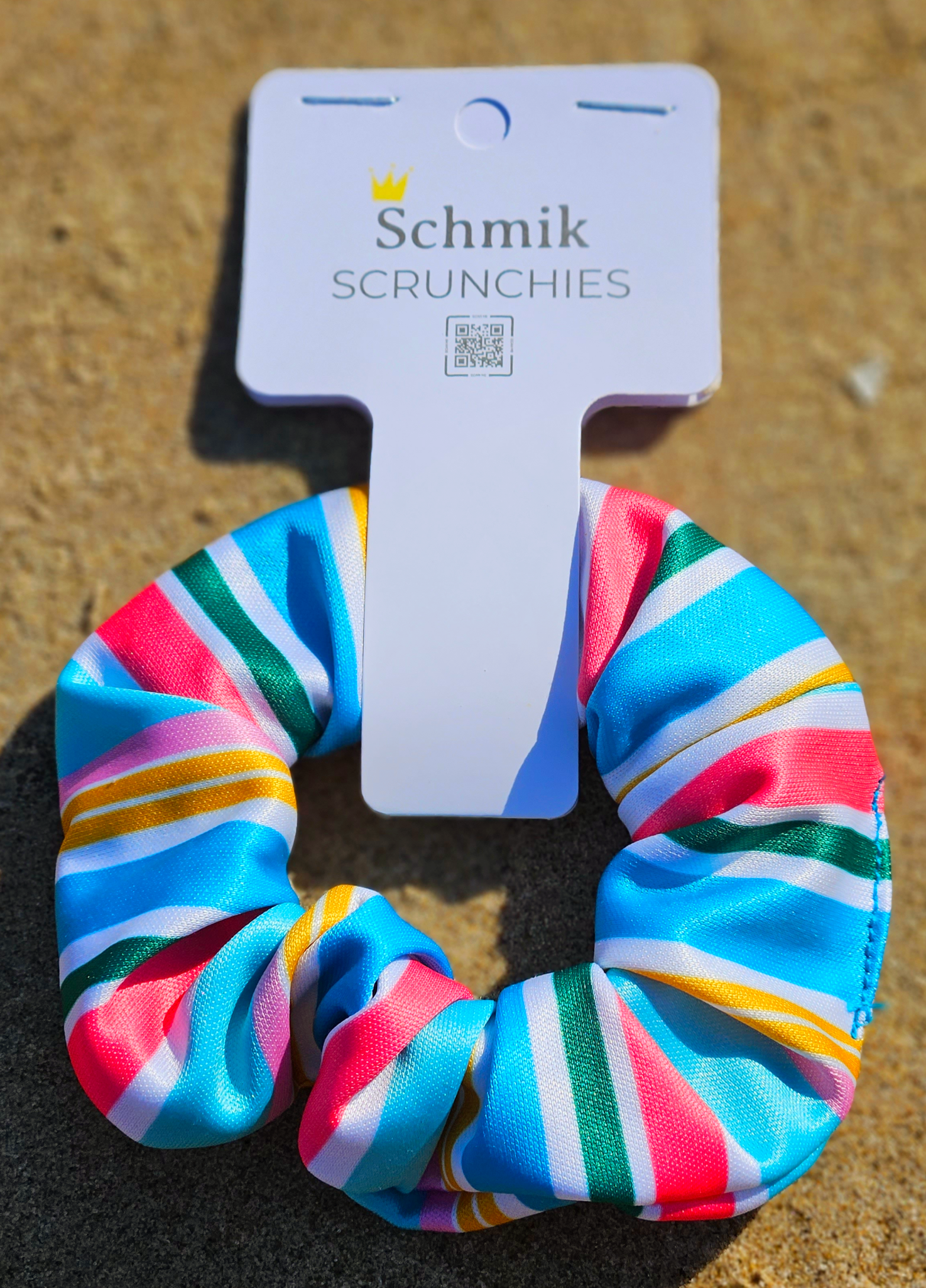 Matching print scrunchie keeping hair secure during swim lessons